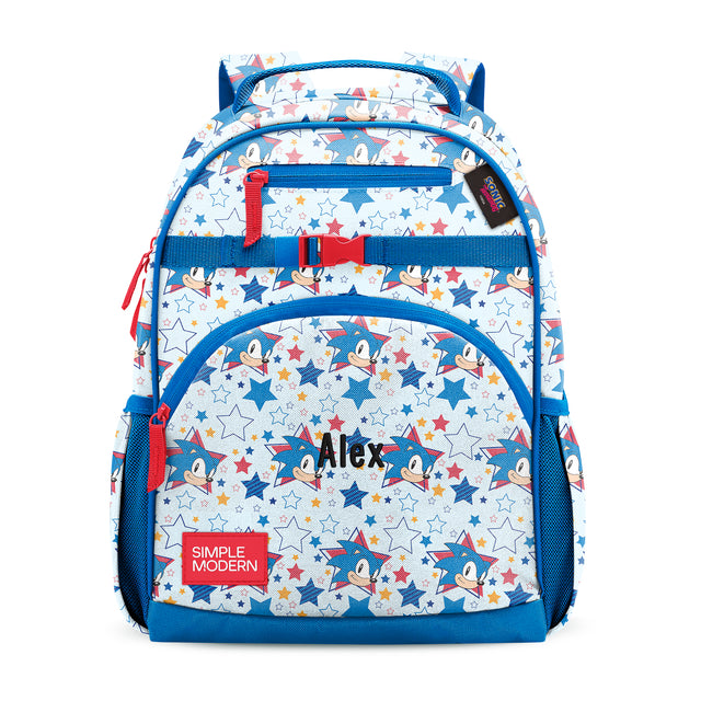 Children's backpack with blue frame, cream body, and red accents featuring Mickey Mouse cartoon characters and colorful stars. Front compartments with Children's backpack with blue frame, cream body, and red accents featuring Mickey Mouse cartoon characters and colorful stars. Front compartments with