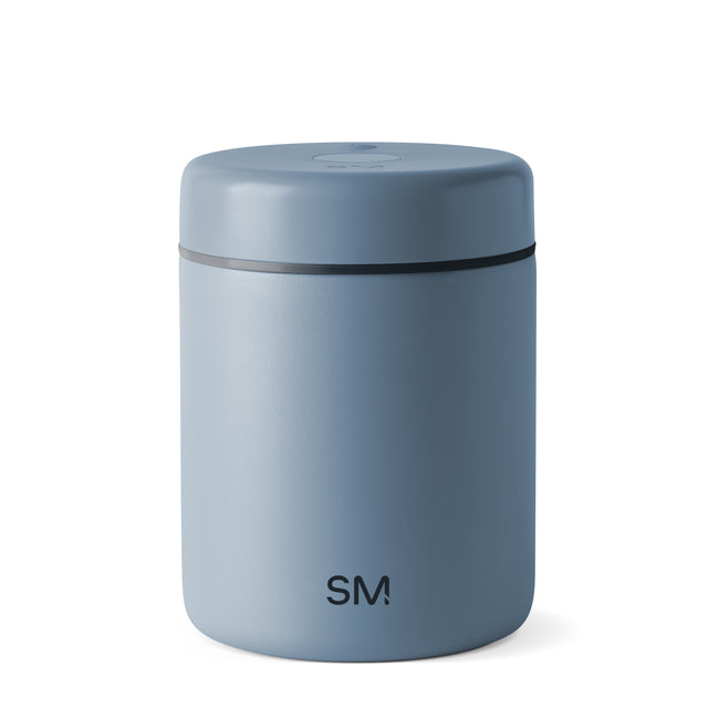 Soft blue-gray cylindrical product with subtle gradient, lighter shade on left side transitioning to deeper blue-gray tone on right side Soft blue-gray cylindrical product with subtle gradient, lighter shade on left side transitioning to deeper blue-gray tone on right side
