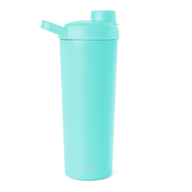 Bright turquoise seafoam water bottle with cylindrical body and lid assembly against white background Bright turquoise seafoam water bottle with cylindrical body and lid assembly against white background
