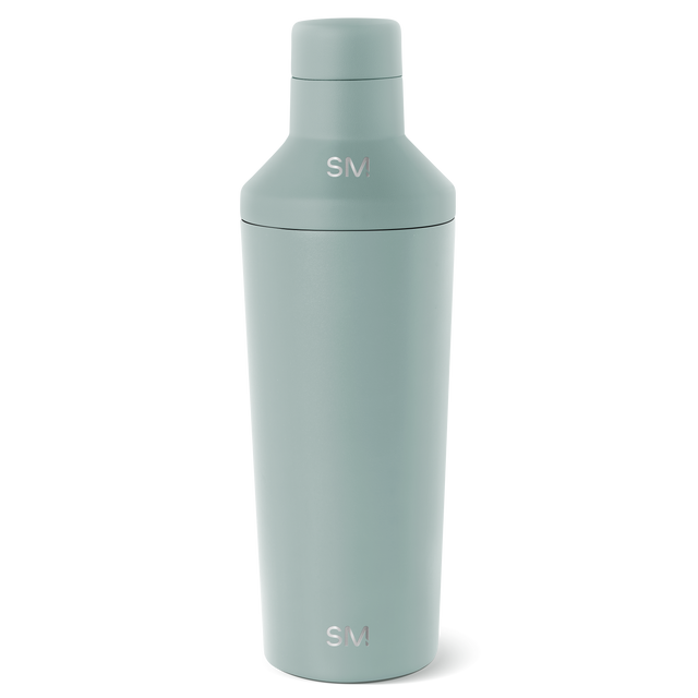 Sage green cylindrical bottle with matching cap on white background Sage green cylindrical bottle with matching cap on white background