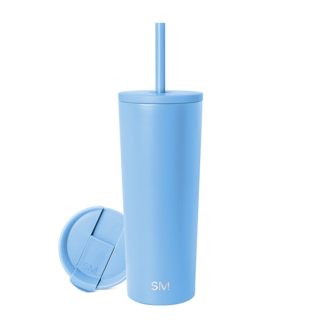 Periwinkle-blue reusable cup with matching lid and straw on white background Periwinkle-blue reusable cup with matching lid and straw on white background