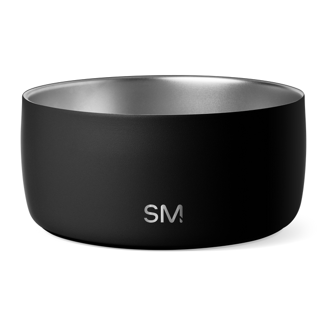 Black matte container with metallic silver interior rim and opening against dark background Black matte container with metallic silver interior rim and opening against dark background
