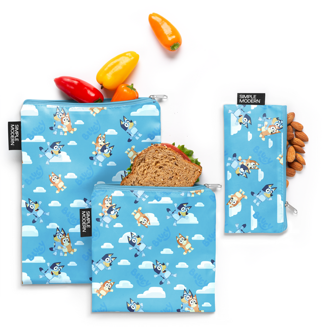 Three sky blue pouches with white clouds and vibrant orange, red, and yellow accents Three sky blue pouches with white clouds and vibrant orange, red, and yellow accents