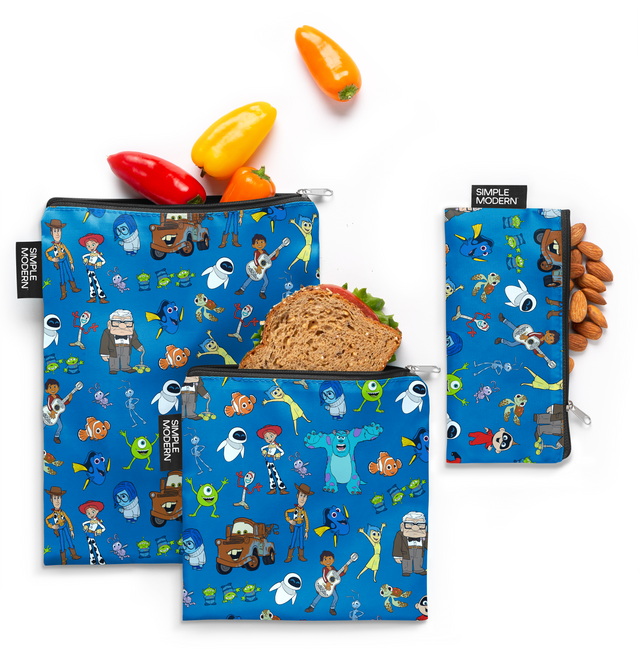 Collection of colorful Pixar-themed lunch bags on royal blue background, featuring bright red, yellow, and accent colors in modern pixelated style design. Collection of colorful Pixar-themed lunch bags on royal blue background, featuring bright red, yellow, and accent colors in modern pixelated style design.