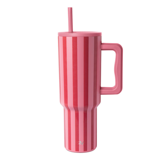 Modern tall tumbler with handle featuring vertical striped pattern in shades of pink, displayed against white background Modern tall tumbler with handle featuring vertical striped pattern in shades of pink, displayed against white background