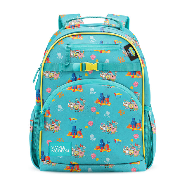 Turquoise children's backpack with underwater theme featuring cartoon submarines, fish, jellyfish, and seashells. Yellow trim accents, dual padded straps, front zippered pockets, and striped bow-tie detail. White background. Turquoise children's backpack with underwater theme featuring cartoon submarines, fish, jellyfish, and seashells. Yellow trim accents, dual padded straps, front zippered pockets, and striped bow-tie detail. White background.