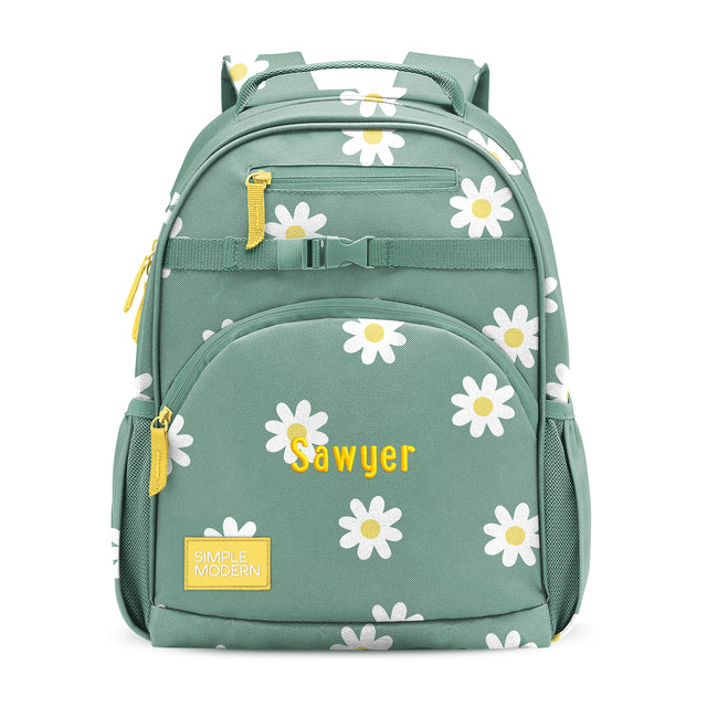 Sage green children's backpack with white daisy pattern, yellow-gold zipper accents, padded straps, side water bottle pockets, and Sage green children's backpack with white daisy pattern, yellow-gold zipper accents, padded straps, side water bottle pockets, and