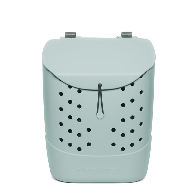 Sage green drawstring backpack with black ventilation holes, gray shoulder straps, and Sage green drawstring backpack with black ventilation holes, gray shoulder straps, and