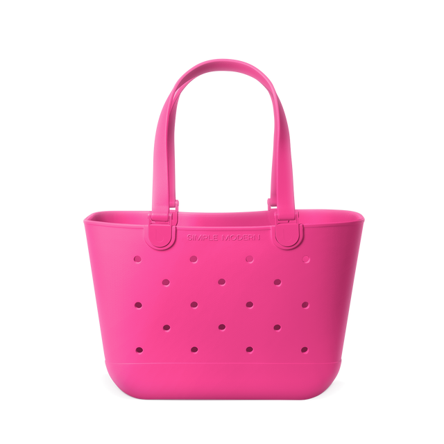 Vibrant hot pink tote bag displayed against a white background Vibrant hot pink tote bag displayed against a white background