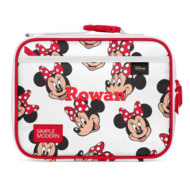 Cream and white Simple Modern lunch box with red trim and handle, featuring an all-over Minnie Mouse pattern with her signature ears and polka dot bow. Personalized with Cream and white Simple Modern lunch box with red trim and handle, featuring an all-over Minnie Mouse pattern with her signature ears and polka dot bow. Personalized with