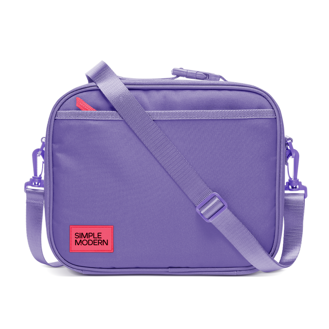 Purple backpack with light purple webbing straps and trim, featuring a bright neon red label detail Purple backpack with light purple webbing straps and trim, featuring a bright neon red label detail
