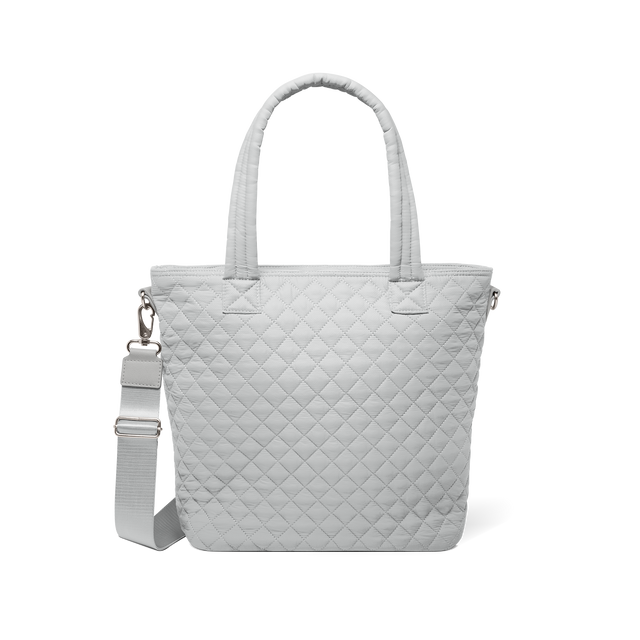 Off-white tote bag with brushed silver D-ring and adjustable strap hardware Off-white tote bag with brushed silver D-ring and adjustable strap hardware