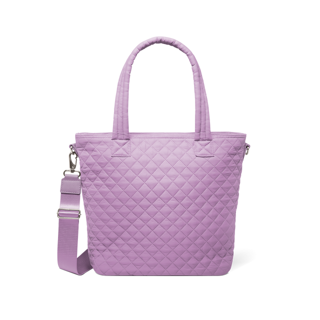Lavender purple tote bag with brushed metal hardware and shoulder strap buckles, front view Lavender purple tote bag with brushed metal hardware and shoulder strap buckles, front view