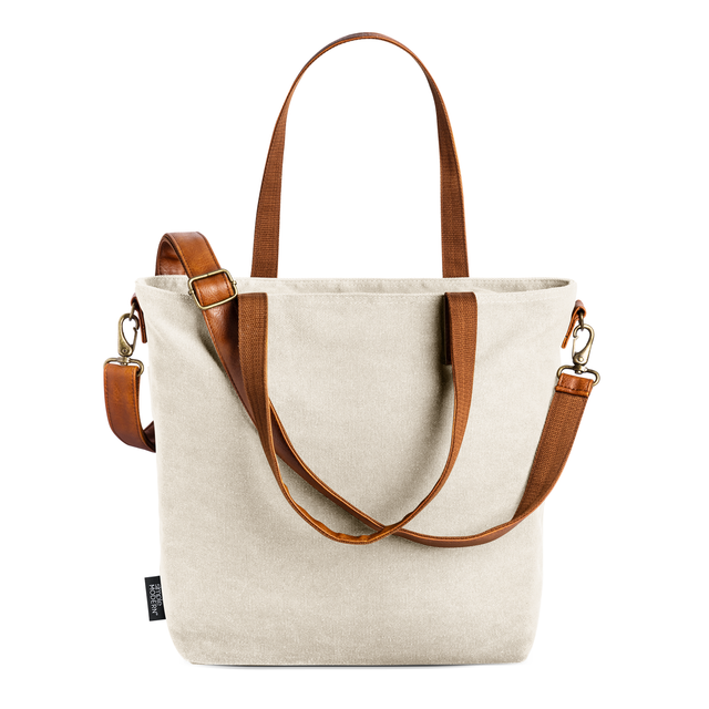 Cream canvas tote bag with open top design and dual handles, made from natural linen-cotton blend fabric in a spacious minimalist style. Cream canvas tote bag with open top design and dual handles, made from natural linen-cotton blend fabric in a spacious minimalist style.