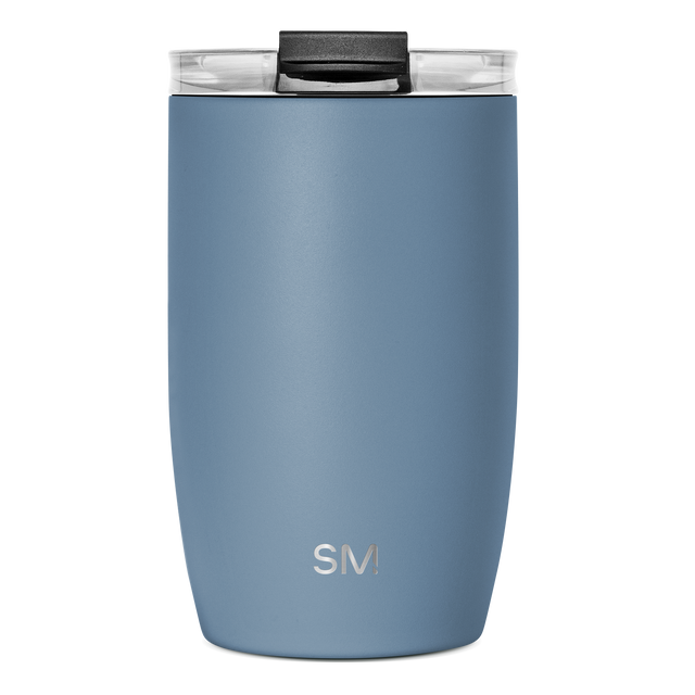 Slate blue insulated tumbler with black handle and clear glass rim, viewed from front angle Slate blue insulated tumbler with black handle and clear glass rim, viewed from front angle