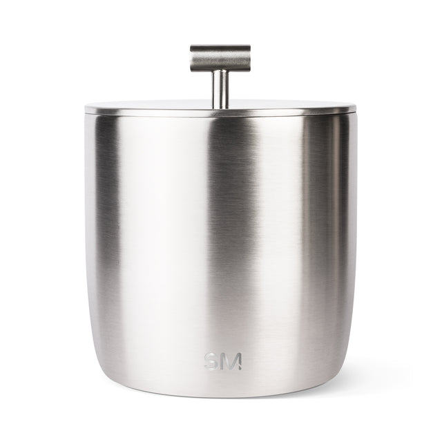 Brushed stainless steel cylindrical container with matte metallic finish and directional surface texture, silver tone Brushed stainless steel cylindrical container with matte metallic finish and directional surface texture, silver tone