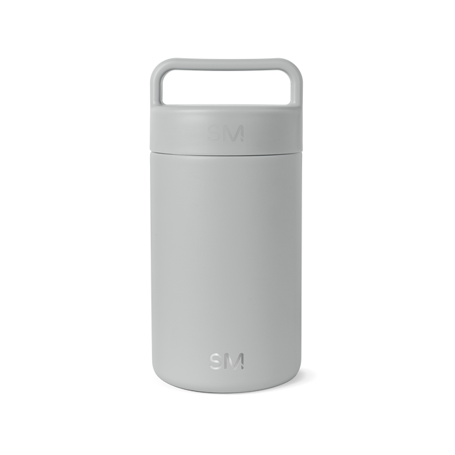 Light gray cylindrical jar container with uniform pale finish and subtle tonal variations created by its cylindrical form and ridged texture Light gray cylindrical jar container with uniform pale finish and subtle tonal variations created by its cylindrical form and ridged texture