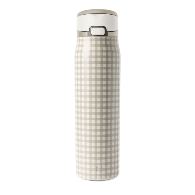 Beige and cream insulated water bottle with white lid and cap Beige and cream insulated water bottle with white lid and cap
