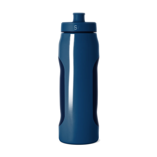 Navy blue water bottle with glossy finish and white highlight reflections on the surface Navy blue water bottle with glossy finish and white highlight reflections on the surface