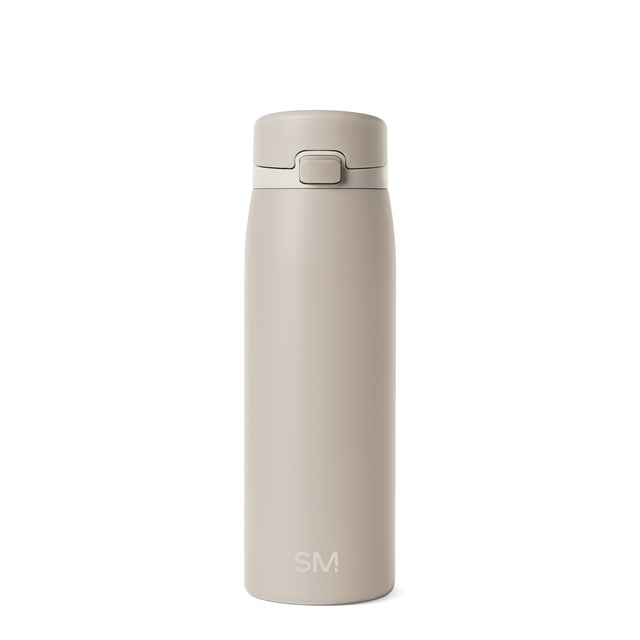SM Vacuum Insulated Bottle in soft beige or off-white color against a white background SM Vacuum Insulated Bottle in soft beige or off-white color against a white background
