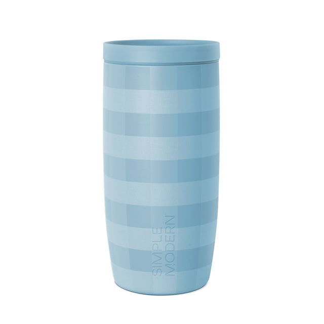 Blue-gray striped ceramic mug with horizontal light blue and teal stripes on cylindrical body Blue-gray striped ceramic mug with horizontal light blue and teal stripes on cylindrical body