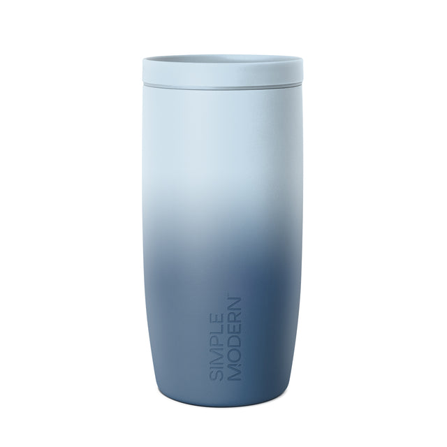 Tall cylindrical tumbler with matching lid in ombre gradient from pale blue to navy blue, featuring Tall cylindrical tumbler with matching lid in ombre gradient from pale blue to navy blue, featuring