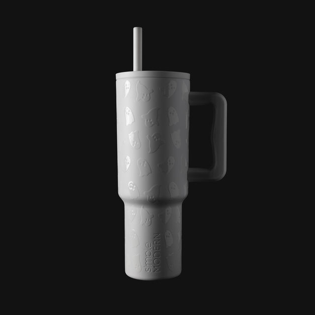 White cylindrical tumbler with light gray shading and dimension, displayed against a white and light gray background. White cylindrical tumbler with light gray shading and dimension, displayed against a white and light gray background.