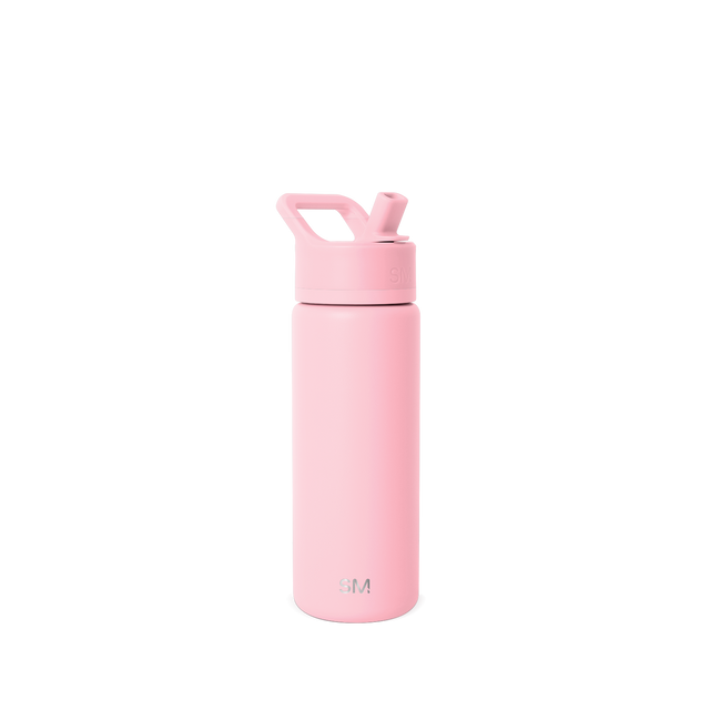 Soft pastel pink water bottle against a light gray background Soft pastel pink water bottle against a light gray background