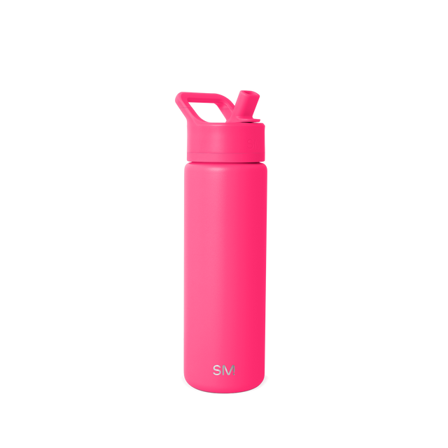 Vibrant hot pink neon-colored product against a neutral off-white background Vibrant hot pink neon-colored product against a neutral off-white background
