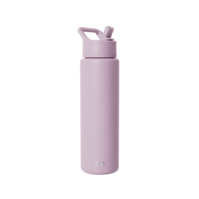 Soft mauve water bottle with matching pale purple lid on white background Soft mauve water bottle with matching pale purple lid on white background