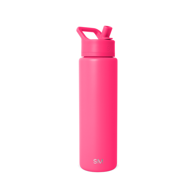 Hot pink water bottle with matching cap and spout on white background Hot pink water bottle with matching cap and spout on white background