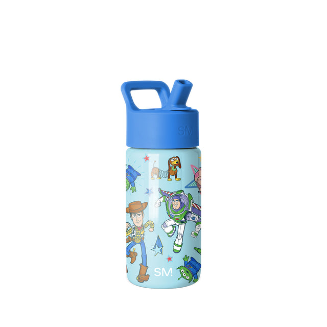 Light blue Simple Modern water bottle with royal blue flip-top lid and handle, featuring Toy Story characters including Buzz Lightyear and Woody in an all-over colorful print design on white background. Light blue Simple Modern water bottle with royal blue flip-top lid and handle, featuring Toy Story characters including Buzz Lightyear and Woody in an all-over colorful print design on white background.
