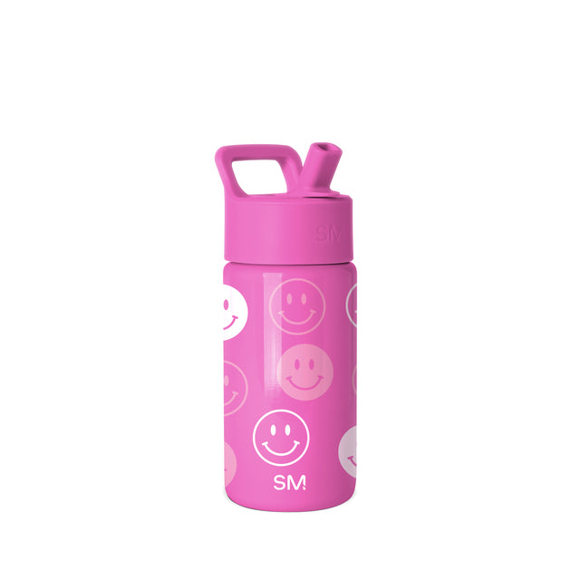 Hot pink Simple Modern water bottle with square carry handle and flip-top spout, featuring repeating white and semi-transparent smiley face pattern throughout the cylindrical body against white background. Hot pink Simple Modern water bottle with square carry handle and flip-top spout, featuring repeating white and semi-transparent smiley face pattern throughout the cylindrical body against white background.