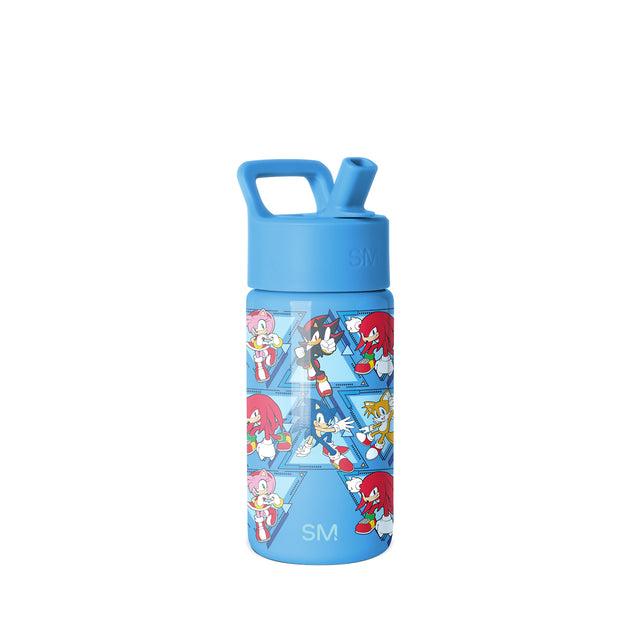Blue Simple Modern water bottle with flip-top lid and carry handle, featuring colorful geometric graphic band with cartoon characters in triangular sections, capacity indicator visible, isolated on white background. Blue Simple Modern water bottle with flip-top lid and carry handle, featuring colorful geometric graphic band with cartoon characters in triangular sections, capacity indicator visible, isolated on white background.