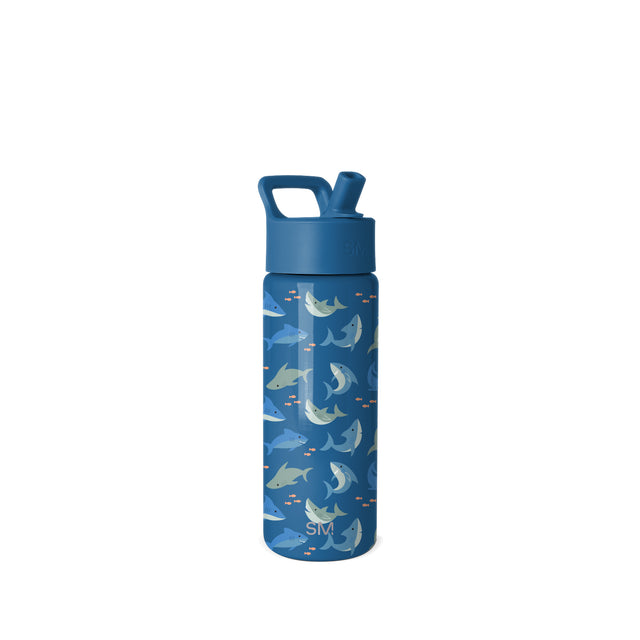 Simple Modern 18-ounce water bottle with deep blue body, bright blue cap and handle, and marine-themed print in cream, pale green, and burnt orange on white background. Simple Modern 18-ounce water bottle with deep blue body, bright blue cap and handle, and marine-themed print in cream, pale green, and burnt orange on white background.