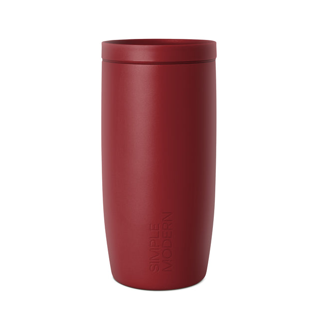 Burgundy wine-red Simple Modern tumbler with fitted lid and matte finish on white background. Minimalist cylindrical travel cup design with tapered base and embossed branding. Burgundy wine-red Simple Modern tumbler with fitted lid and matte finish on white background. Minimalist cylindrical travel cup design with tapered base and embossed branding.
