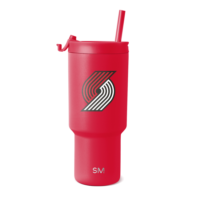 Bright red cylindrical tumbler with matching red straw Bright red cylindrical tumbler with matching red straw