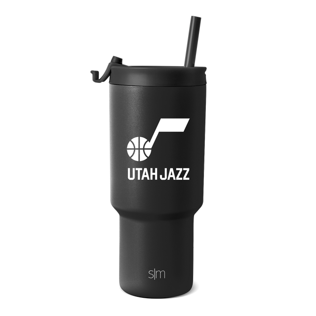 Matte black insulated tumbler with matching black straw and lid cap, featuring a cylindrical design with charcoal undertone for a monochromatic look. Matte black insulated tumbler with matching black straw and lid cap, featuring a cylindrical design with charcoal undertone for a monochromatic look.