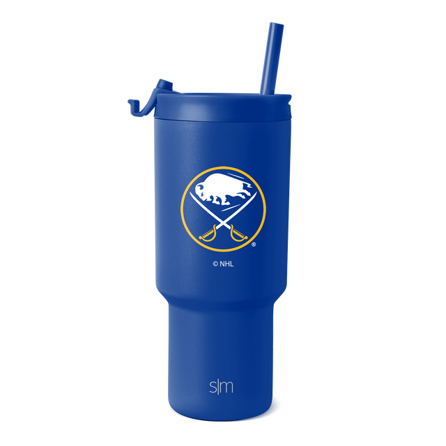 Cobalt blue matte tumbler with white and gold logo accents Cobalt blue matte tumbler with white and gold logo accents