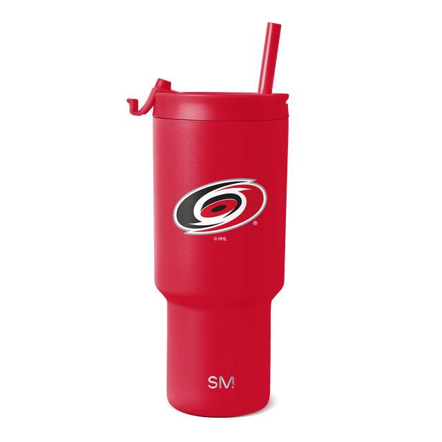 Red tumbler with matching red straw, lid, and handle Red tumbler with matching red straw, lid, and handle
