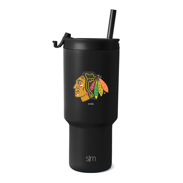 Matte black Chicago Blackhawks tumbler with gold, red, orange, green, and yellow logo graphic Matte black Chicago Blackhawks tumbler with gold, red, orange, green, and yellow logo graphic