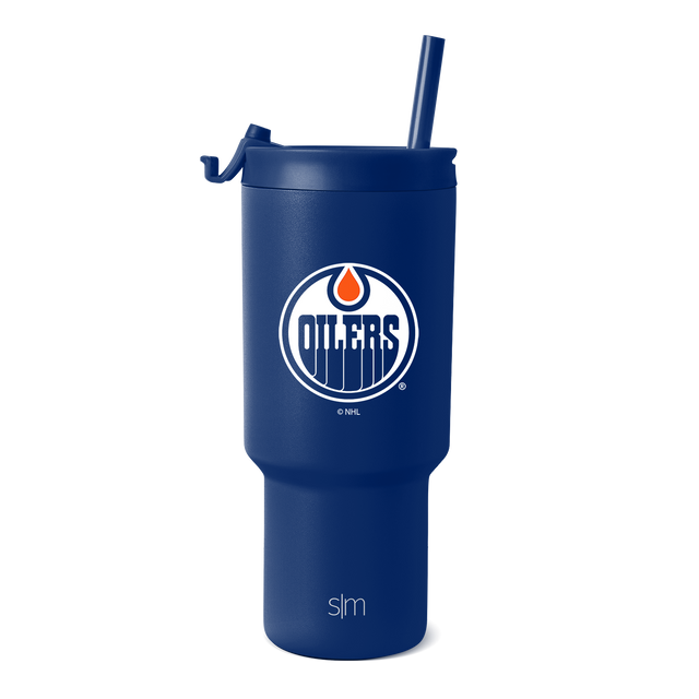 Royal blue tumbler with white text branding and orange accent details Royal blue tumbler with white text branding and orange accent details