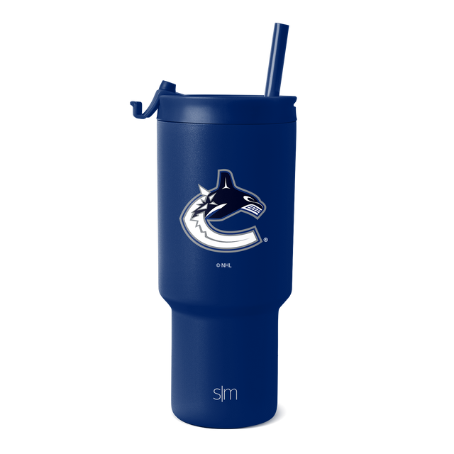 Navy blue insulated tumbler with white and silver metallic team logo and branding accents on cylindrical body and lid Navy blue insulated tumbler with white and silver metallic team logo and branding accents on cylindrical body and lid