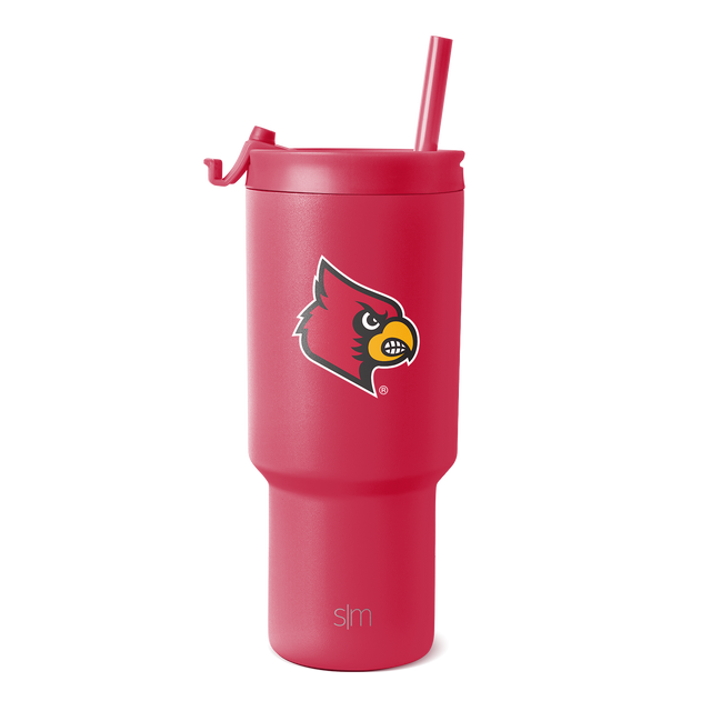 Coral red insulated tumbler with stainless steel construction, shown against white background Coral red insulated tumbler with stainless steel construction, shown against white background