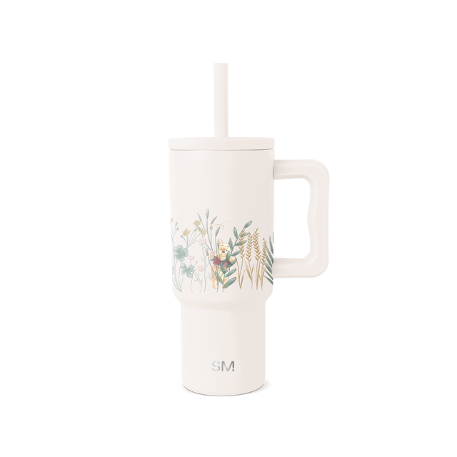 Cream-colored tumbler with muted watercolor botanical illustration on front Cream-colored tumbler with muted watercolor botanical illustration on front