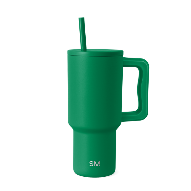 Kelly green insulated tumbler with lid on white background Kelly green insulated tumbler with lid on white background