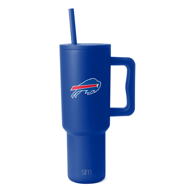 Royal blue insulated tumbler with white handle and logo accents, red secondary design details Royal blue insulated tumbler with white handle and logo accents, red secondary design details