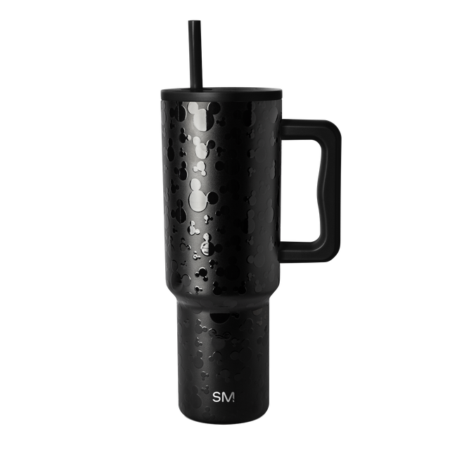 Matte black stainless steel tumbler with handle, cylindrical shape with tapered top, on white background Matte black stainless steel tumbler with handle, cylindrical shape with tapered top, on white background