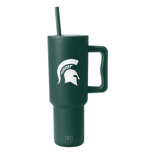 Deep forest green tumbler with matching straw and handle hardware, white logo and SM branding Deep forest green tumbler with matching straw and handle hardware, white logo and SM branding
