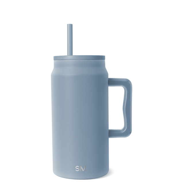 Soft matte blue-gray tumbler with frosted finish on white background Soft matte blue-gray tumbler with frosted finish on white background